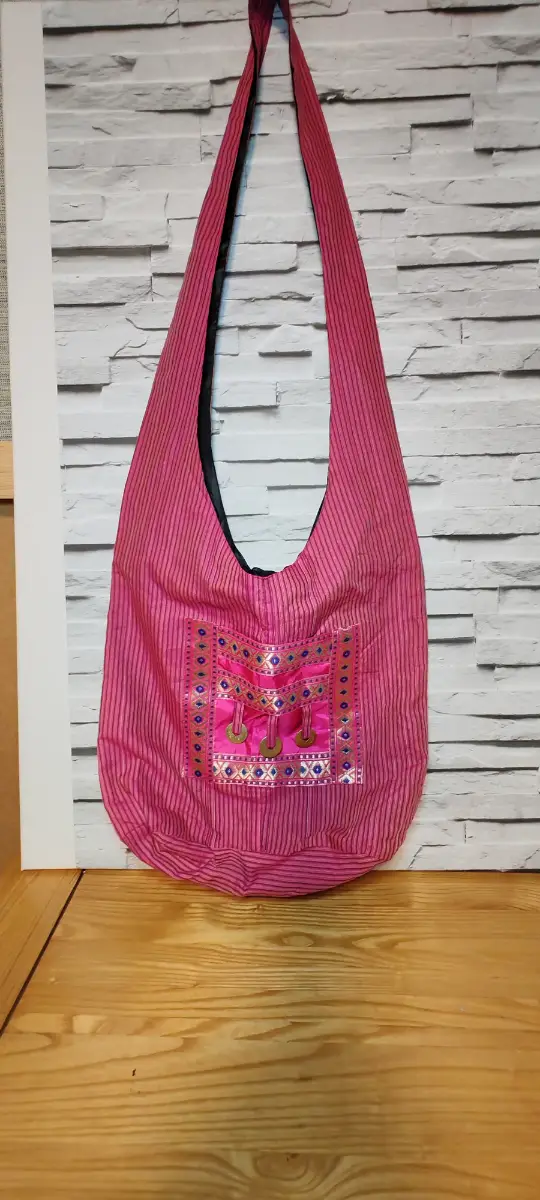 Stunning embroidery red design festival bag.