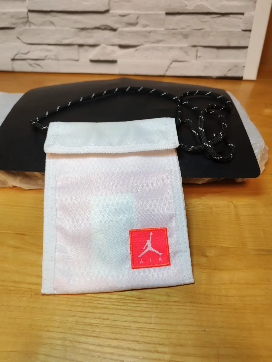 Air Jordan unisex Jump Man Small Bag In pink.