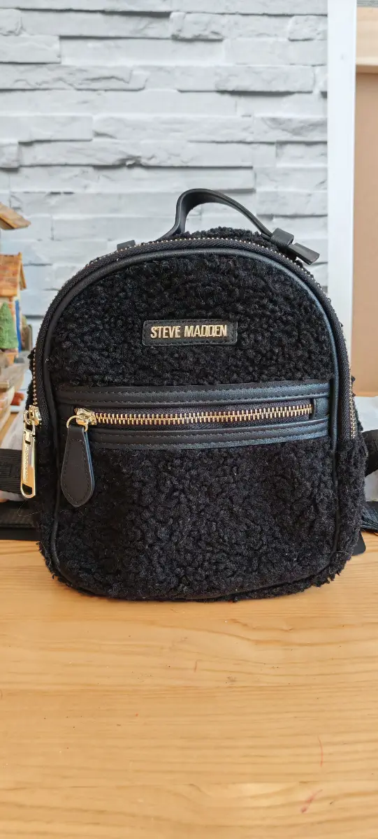 Steve Madden Sherpa mini backpack.