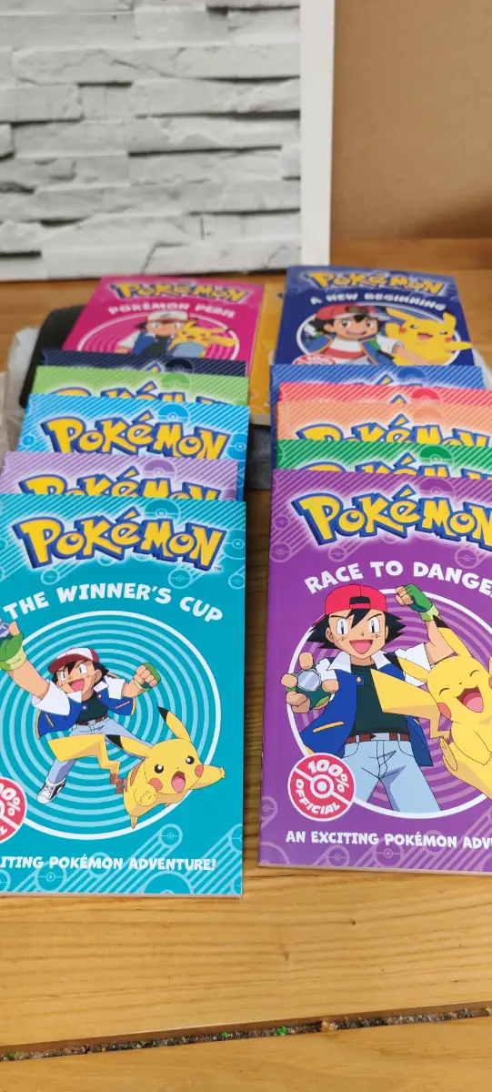 13 x Pokémon adventure reading books.