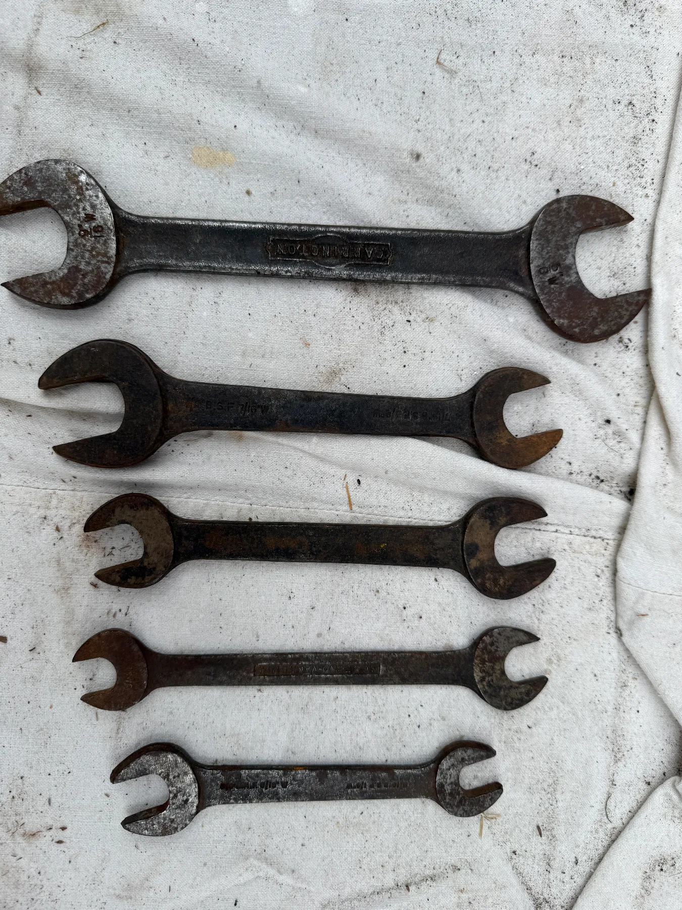 A collection of five vintage drop-forged, double-ended open-jaw spanners