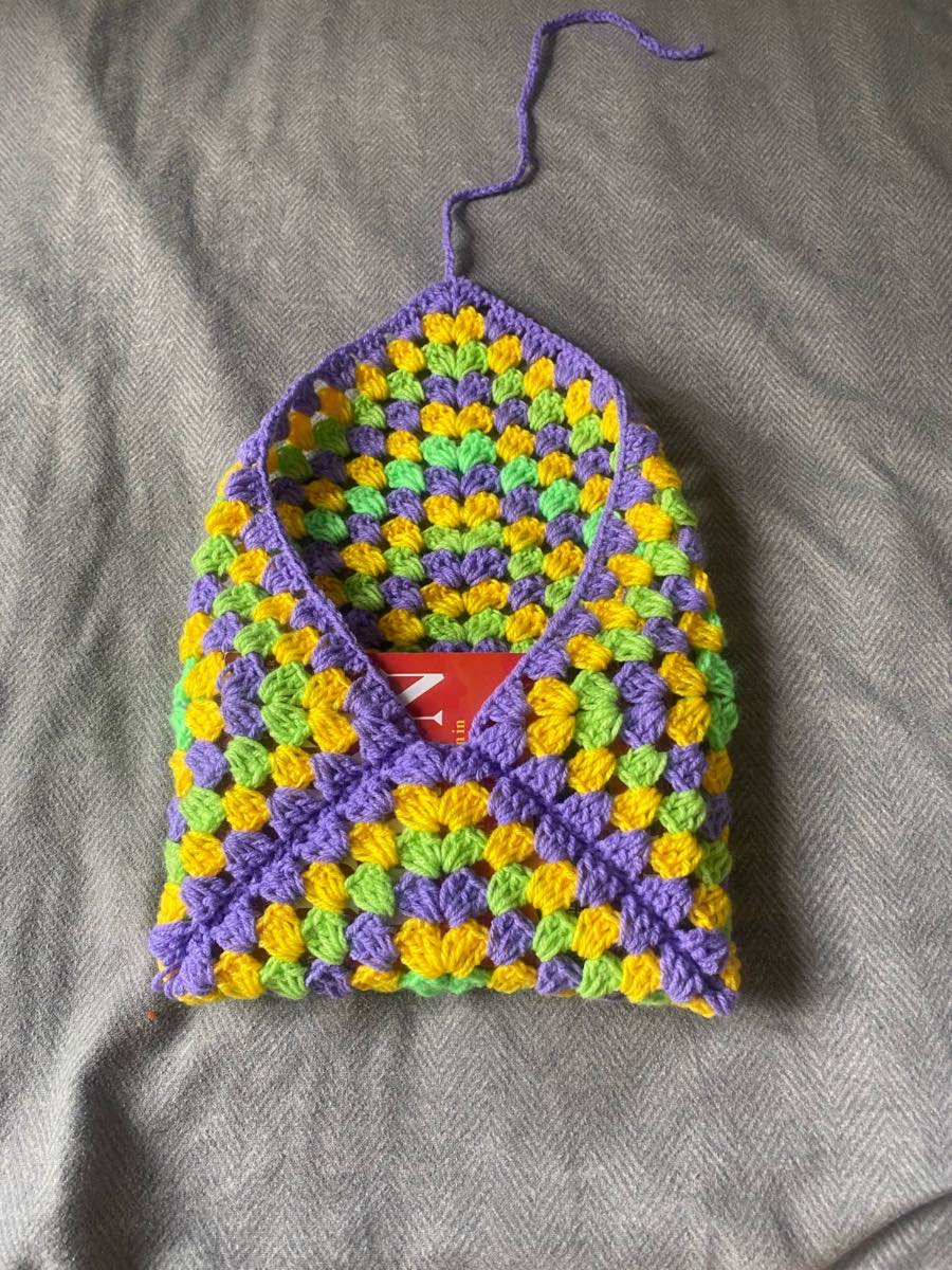 Crocheted Purple, Yellow And Green Book Sleeve