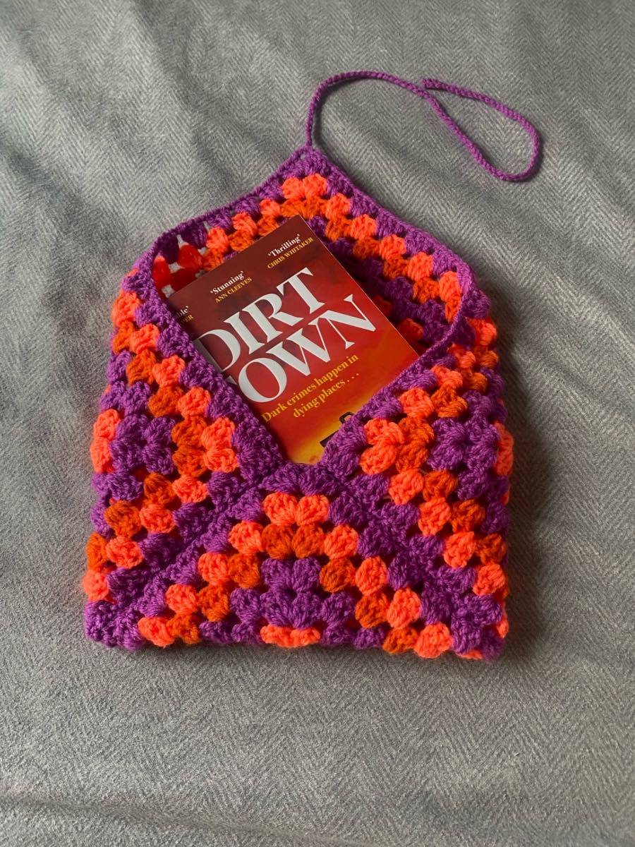 Crocheted Purple, Orange And Coral Book Sleeve
