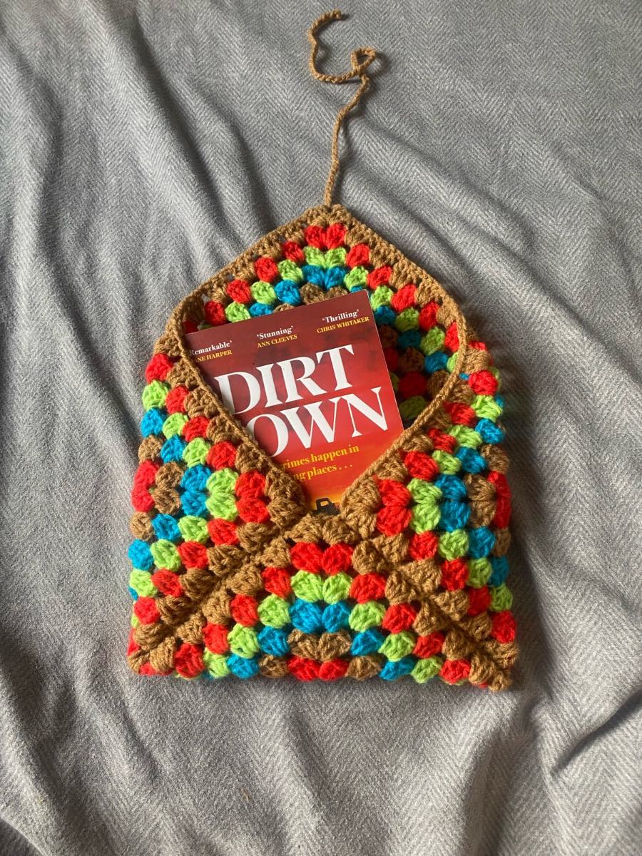 Crocheted Brown, Green, Blue And Red Book Sleeve