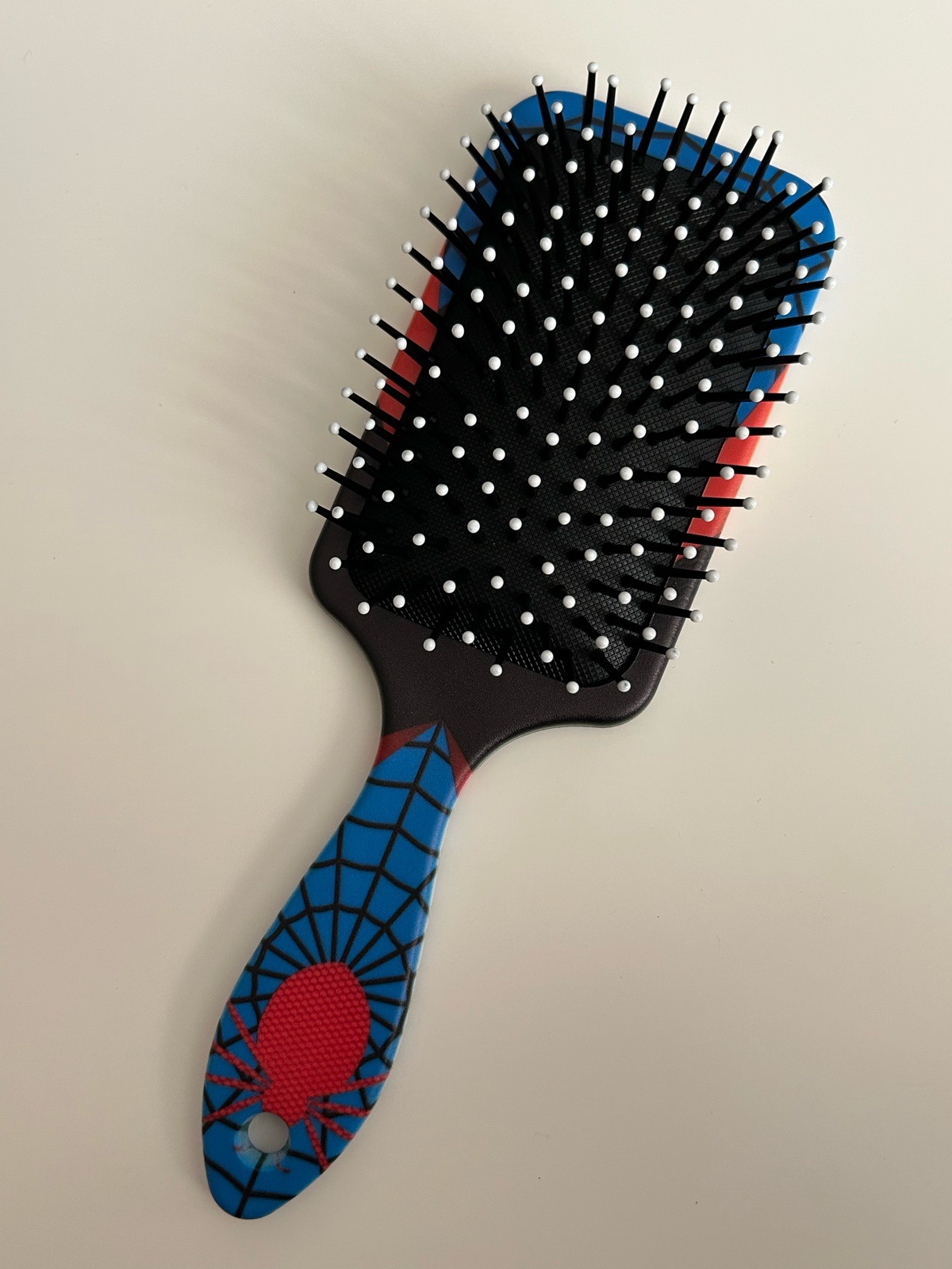 Spider-Man themed paddle hair brush