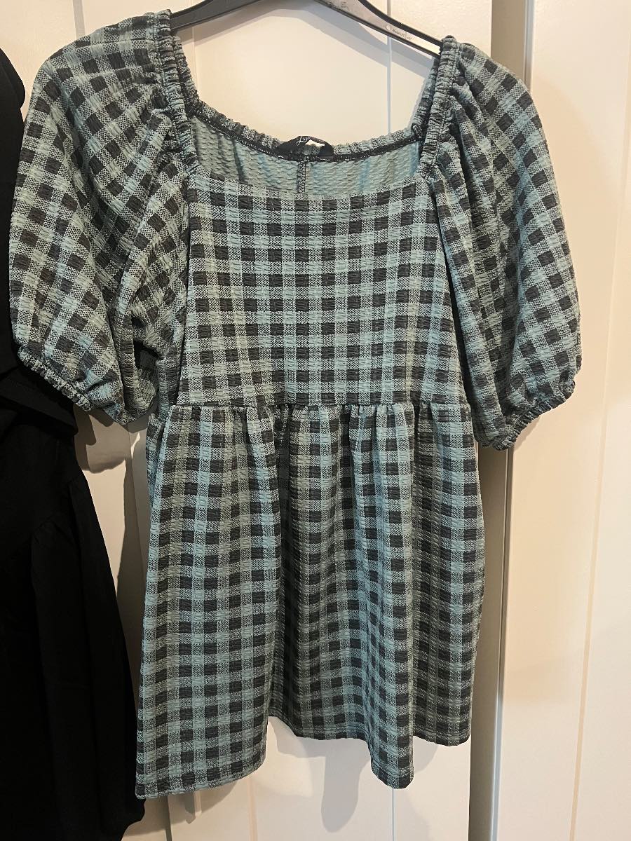 Checked peplum style top
