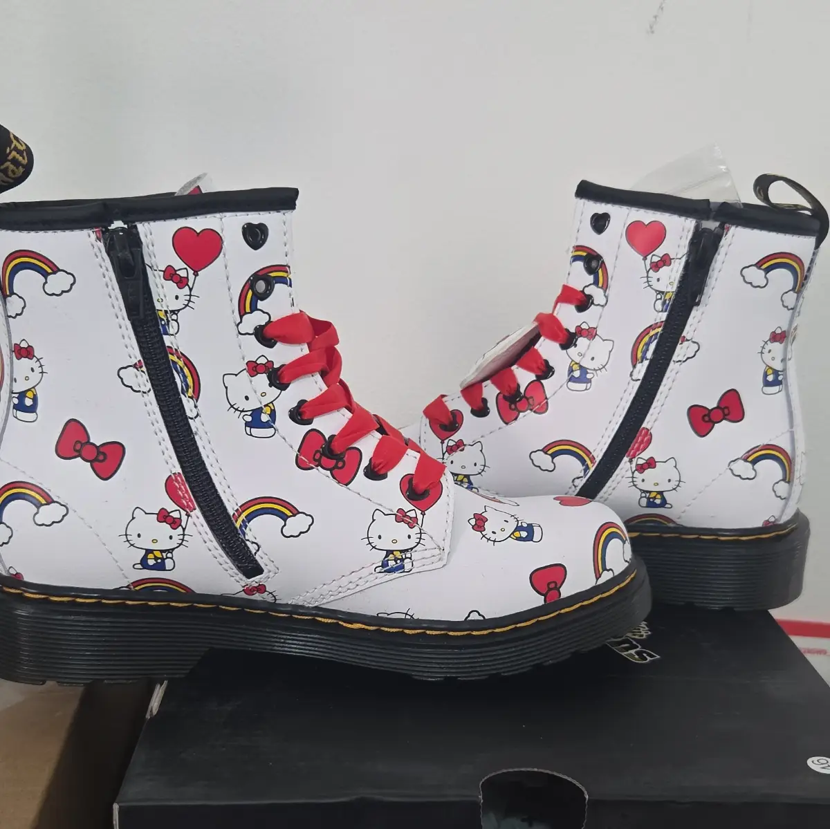 The Dr. Martens Junior 1460 Hello Kitty Boots 2.5
