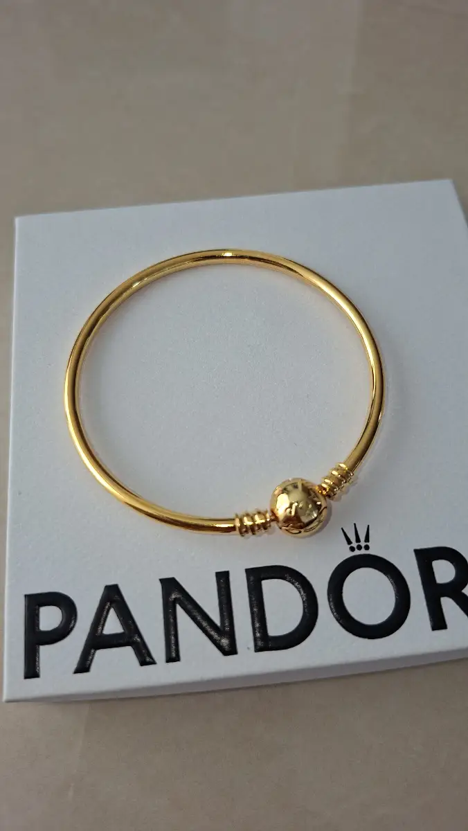 Pandora gold bangle 21cm