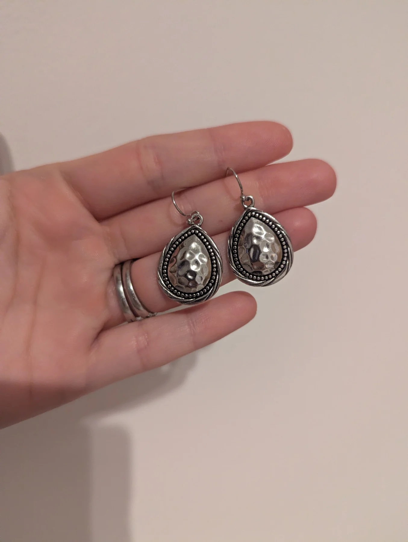 Hammered metal teardrop shape dangle earrings