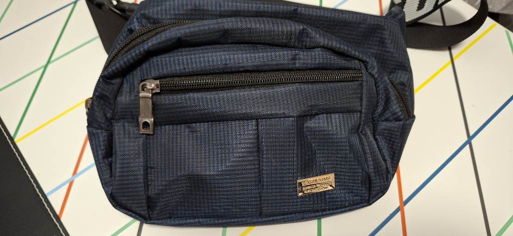 Blue/black bum bag by Reason