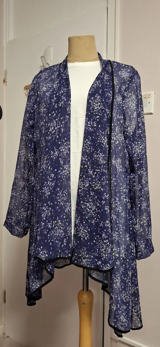 Sheer spotted long sleeved kimono size 14
