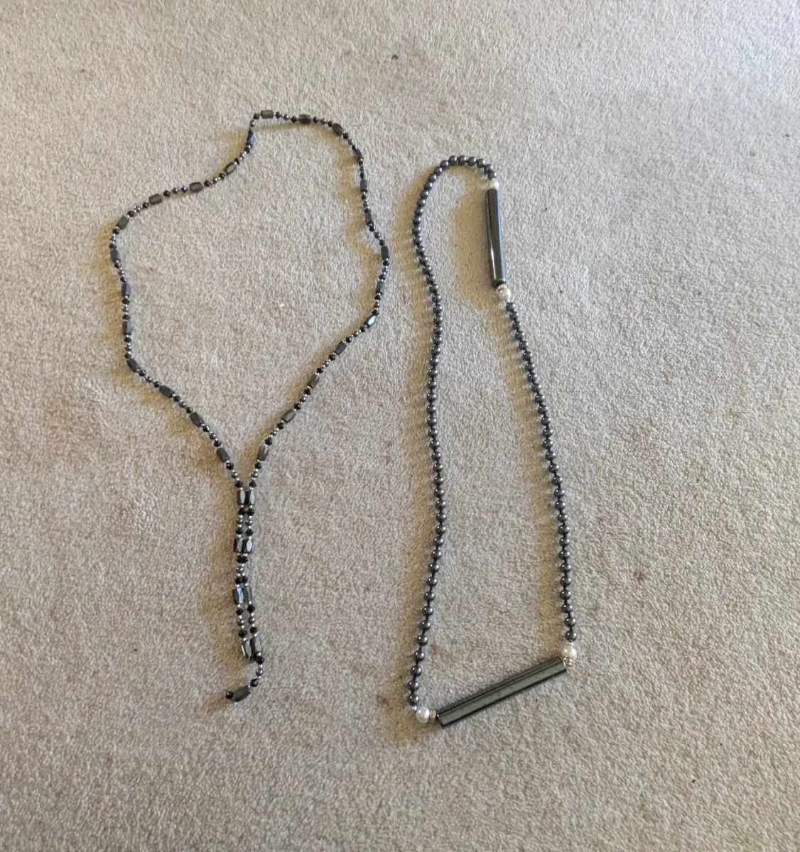 Two high quality gun metal designer necklaces/bracelet.