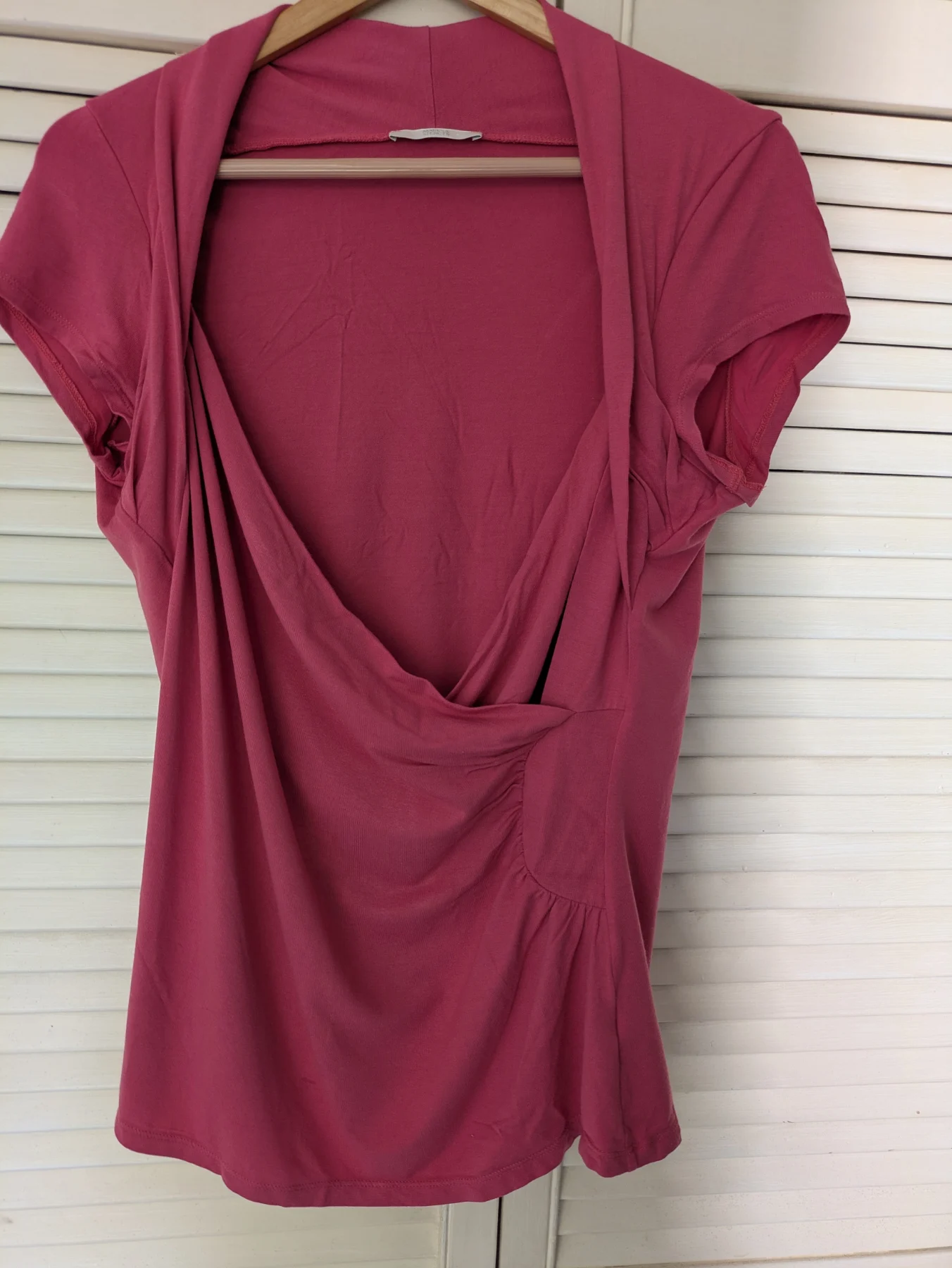 Pink stretchy M&S wrap style top. Size 18.