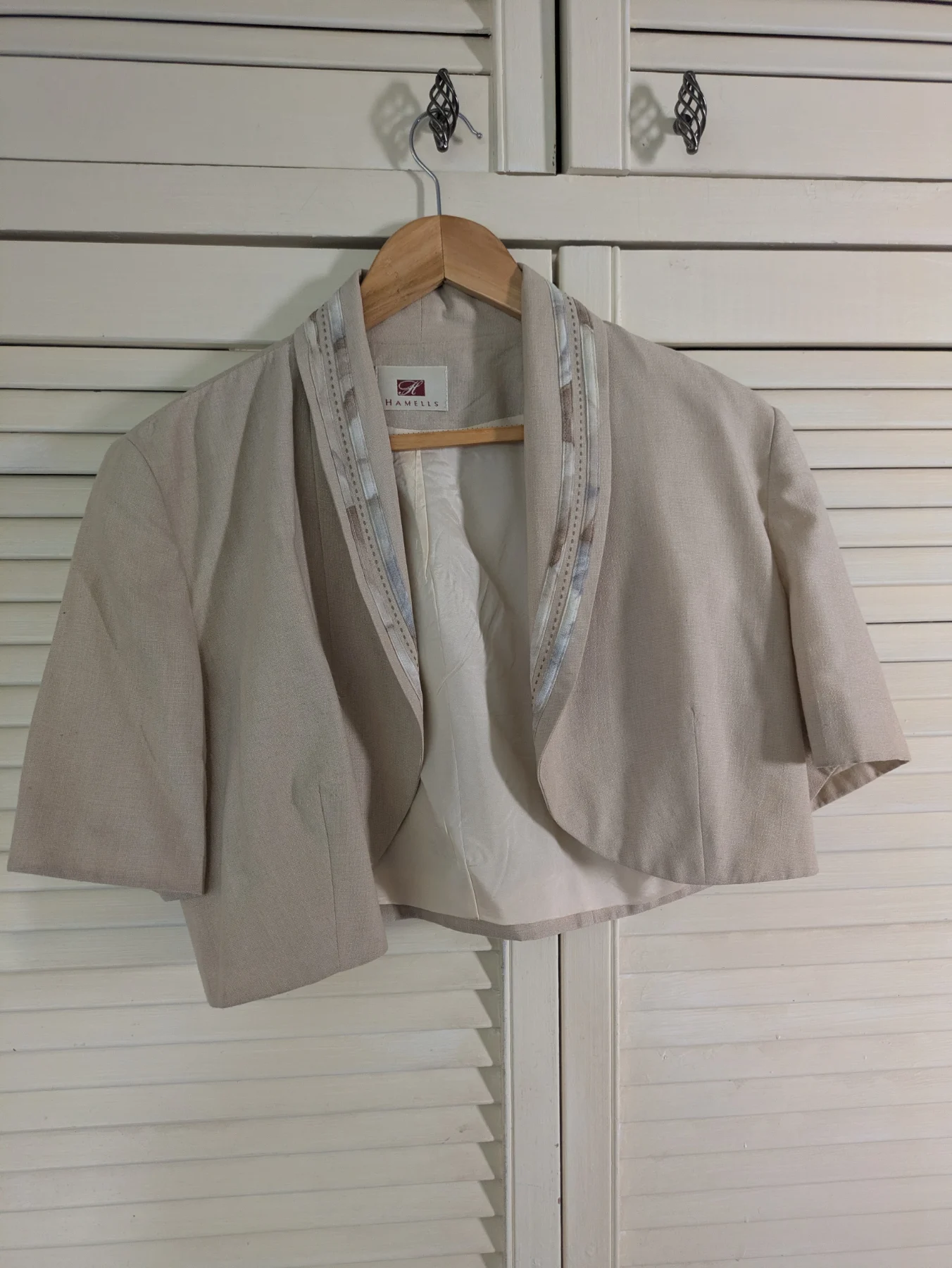 Size 14 cream lined bolero. Hammels.