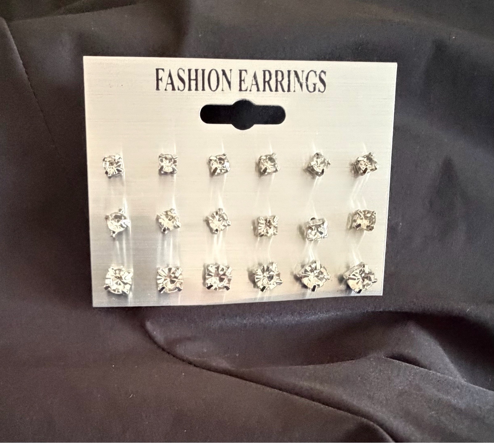 9 pairs of sparkling stood earrings