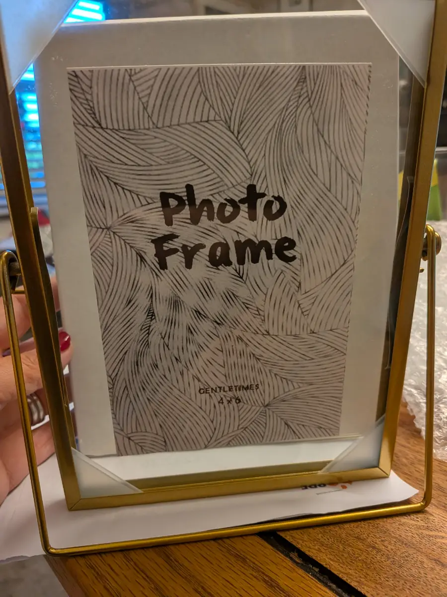 Unused Gentletimes 4x6 Gold Floating Picture Frame - Swivel Desk Stand