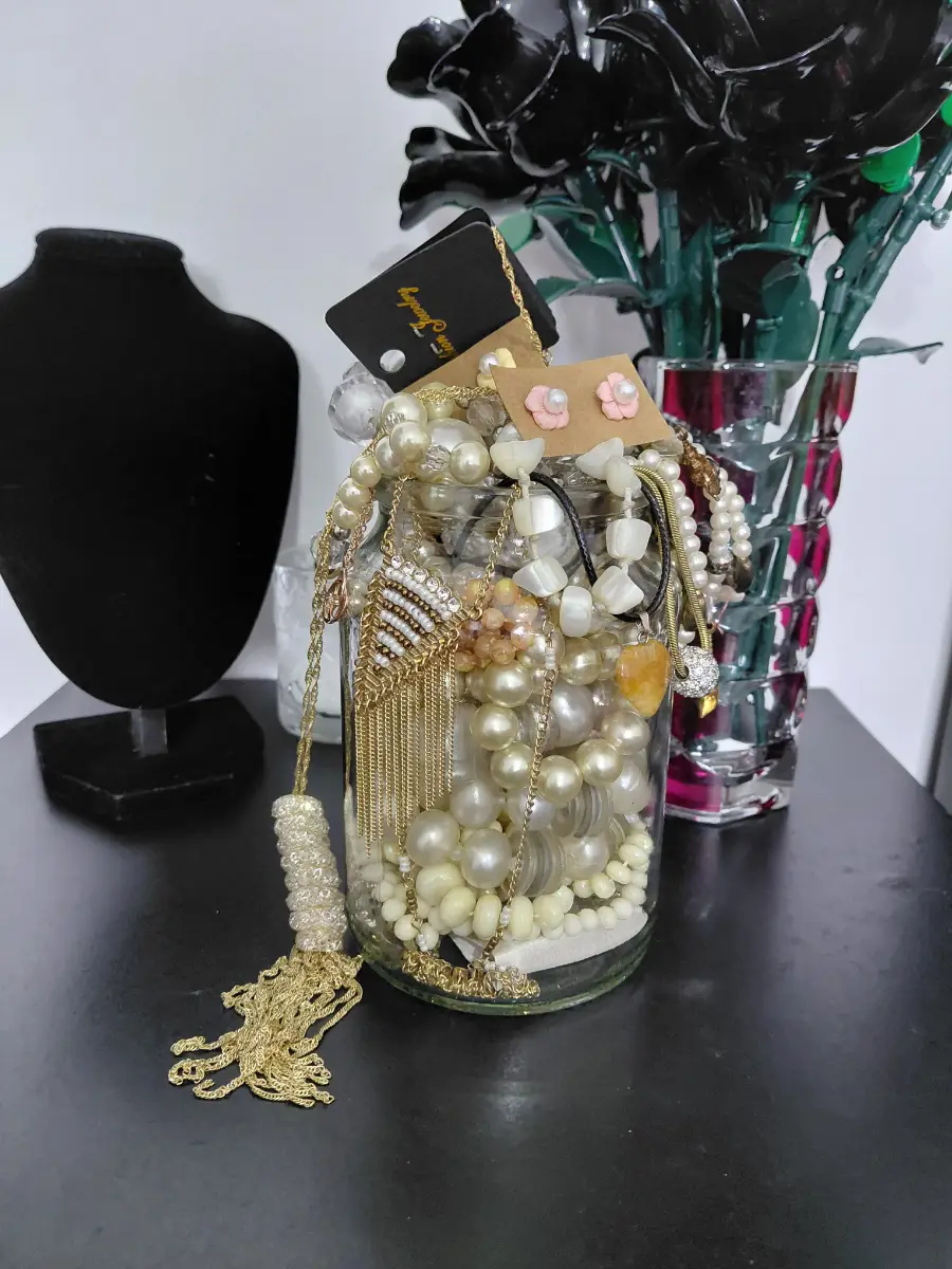 Beach theamed gold and pearl costume jewelery jar