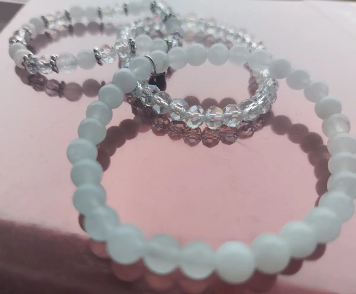 Three translucent and clear bead elasticated bracelets
