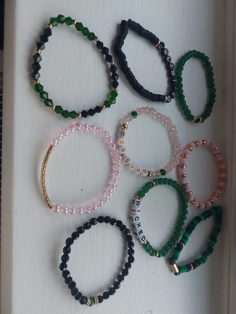 Nine friendship bracelets - good witch/bad witch