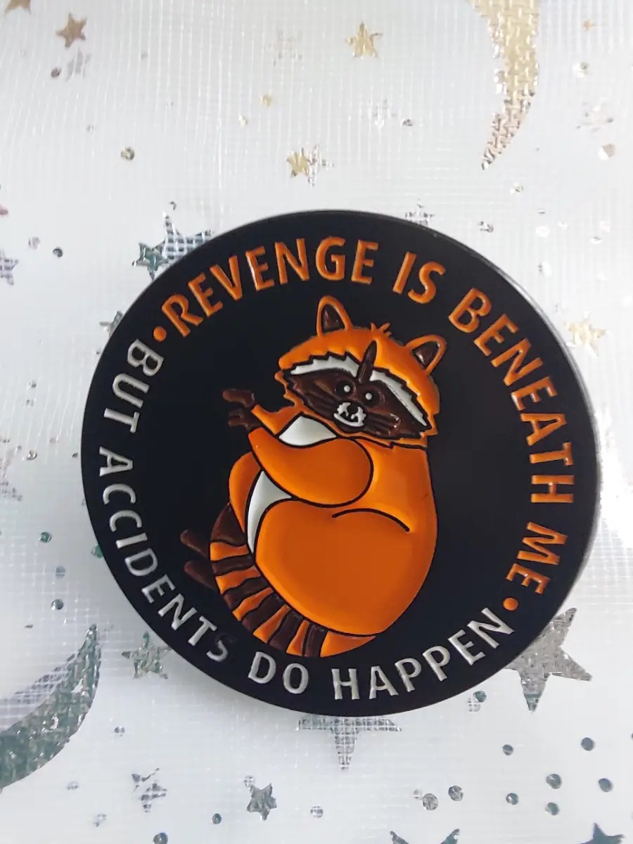Revenge is beneath me raccoon pin badge