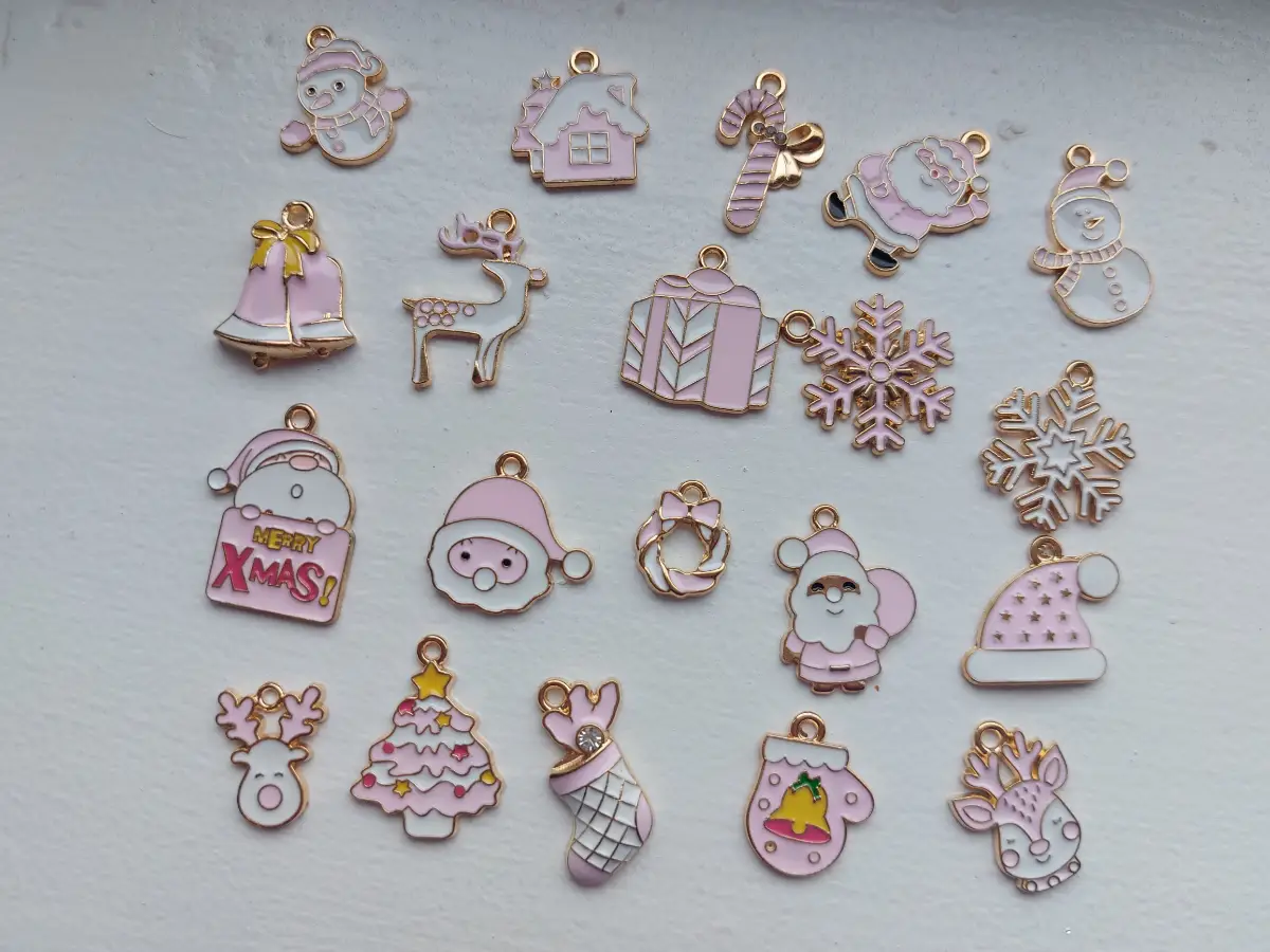 Twenty pink and white Christmas themed charms