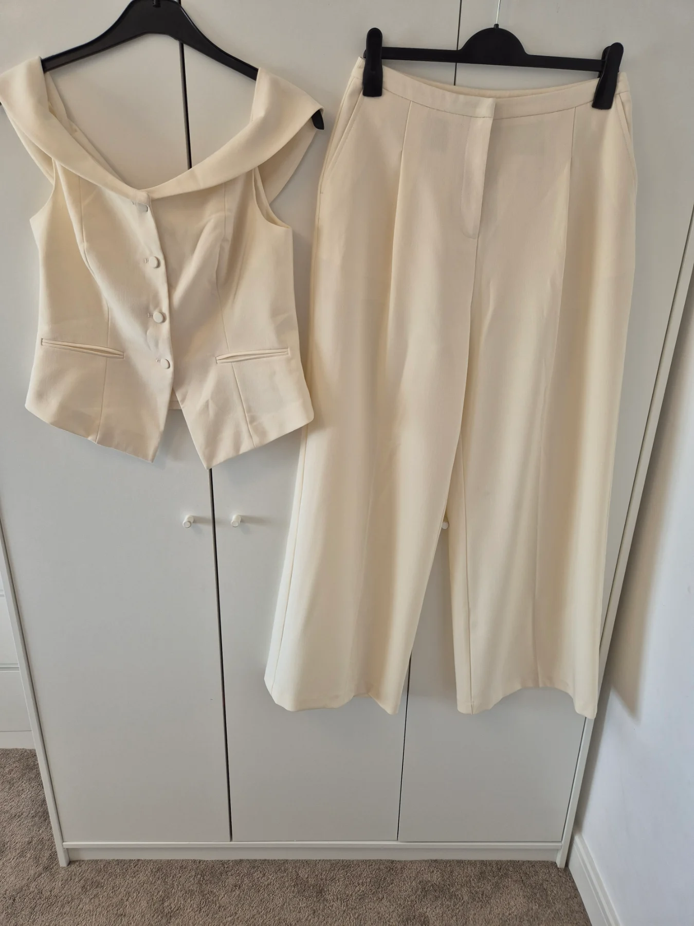 Stunning cream matching two peice waistcoat and trousers suit