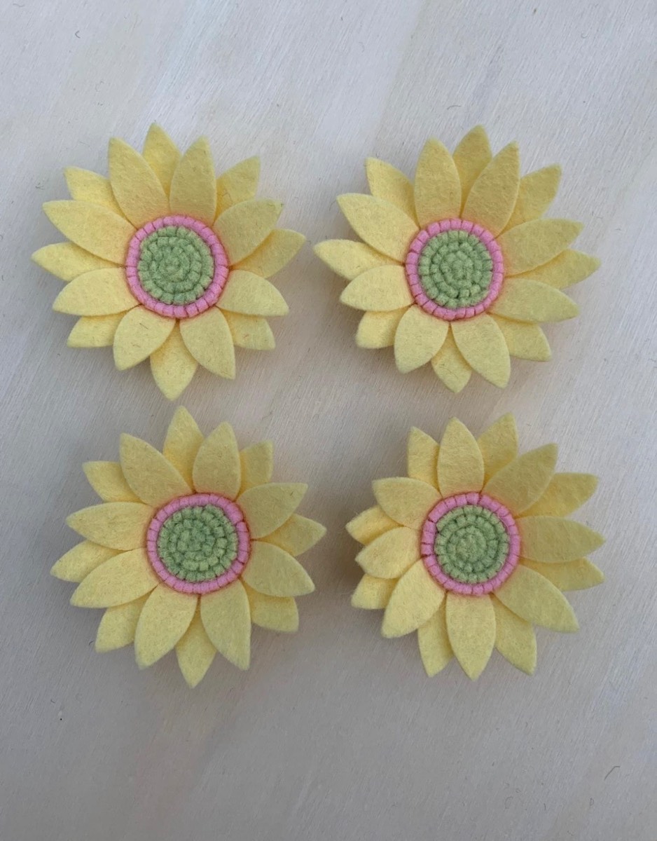 Soft pastel felt flowers.