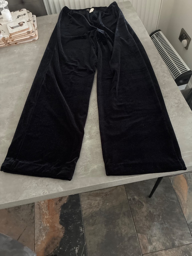 Tracy Evan’s black velvet trousers