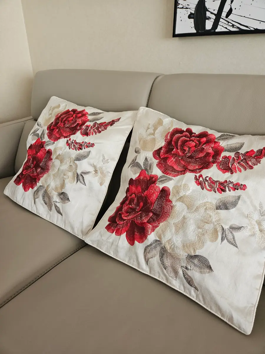 Embroidered cushion covers x 2