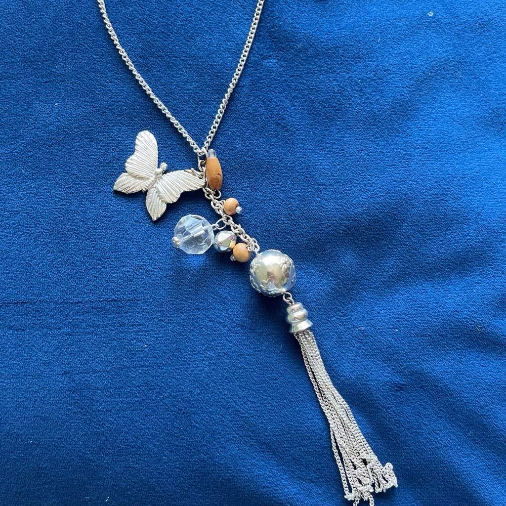 Pretty silver tone charm necklace