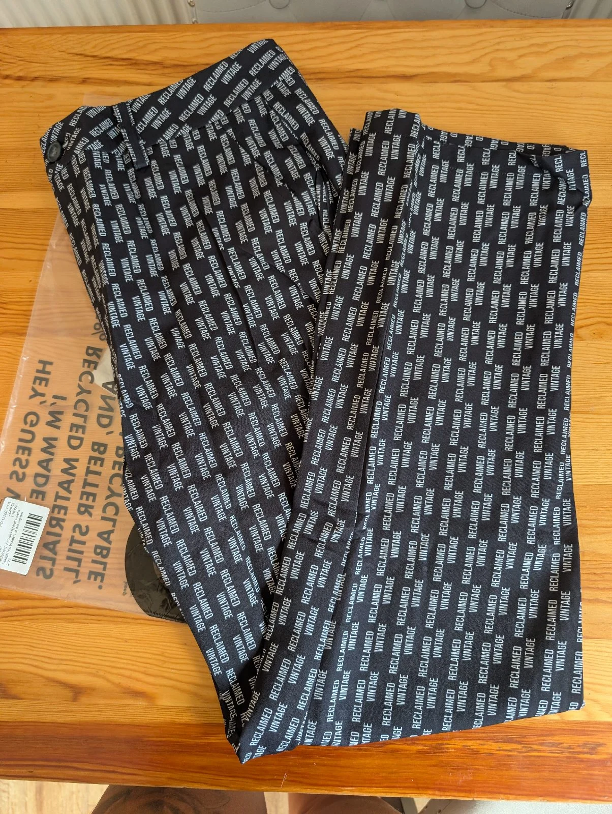 Reclaimed vintage inspired unisex straight leg trousers in monogram print size 32w  Rrp 32.99£