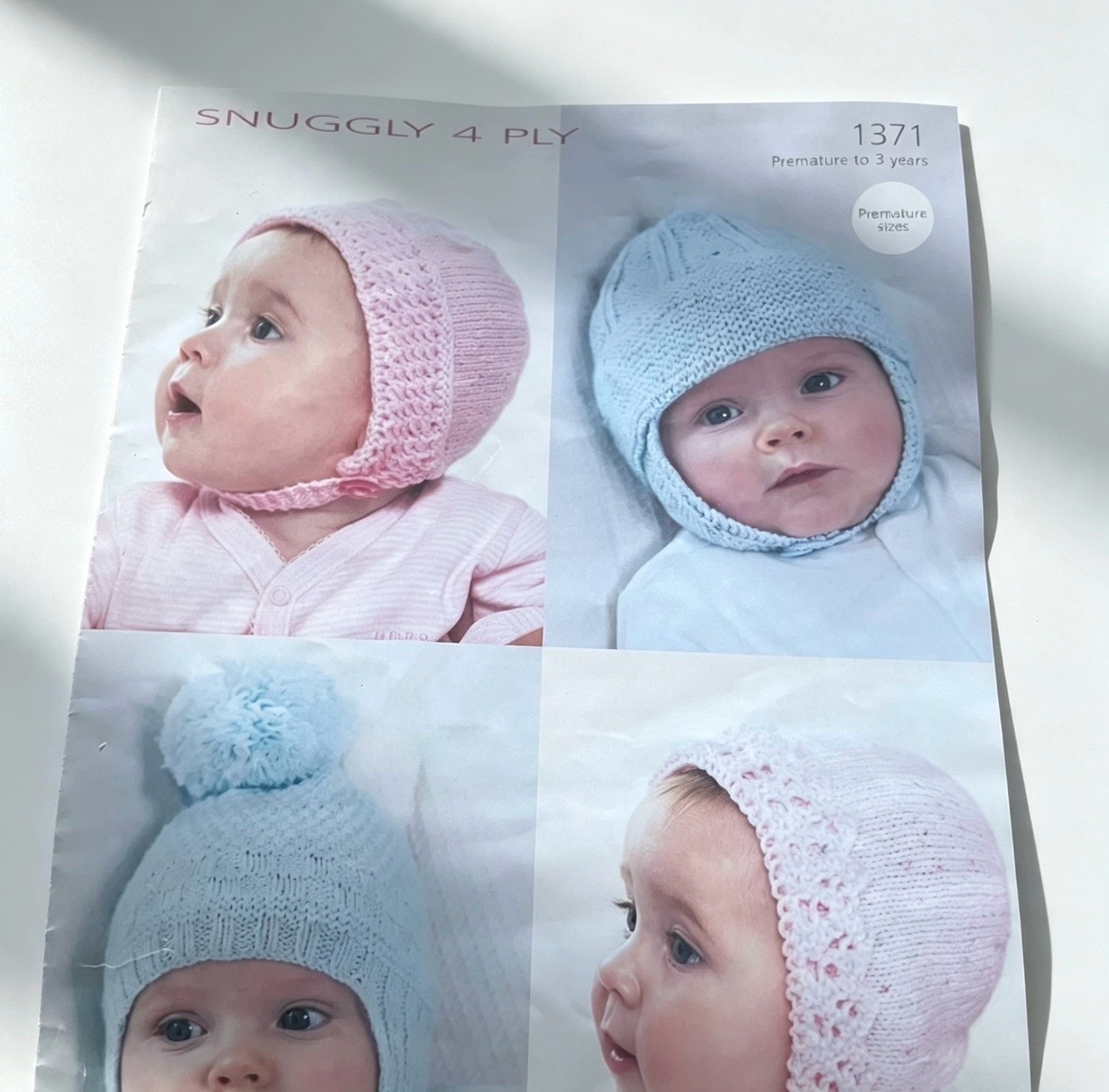 Snuggly 4 Ply 1371 Baby Hats Knitting Pattern — Premature to 3 Years, 4 Designs