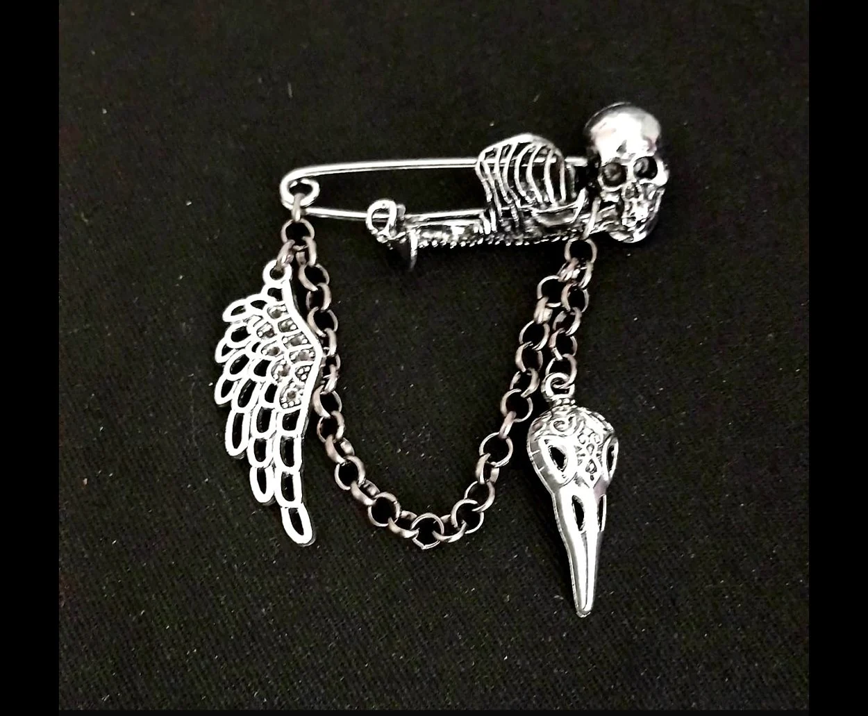 Skeleton brooch