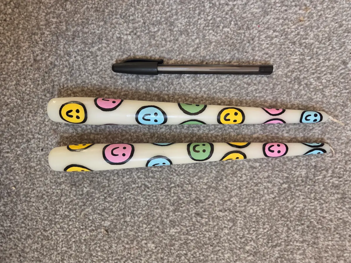 Smiley taper candles