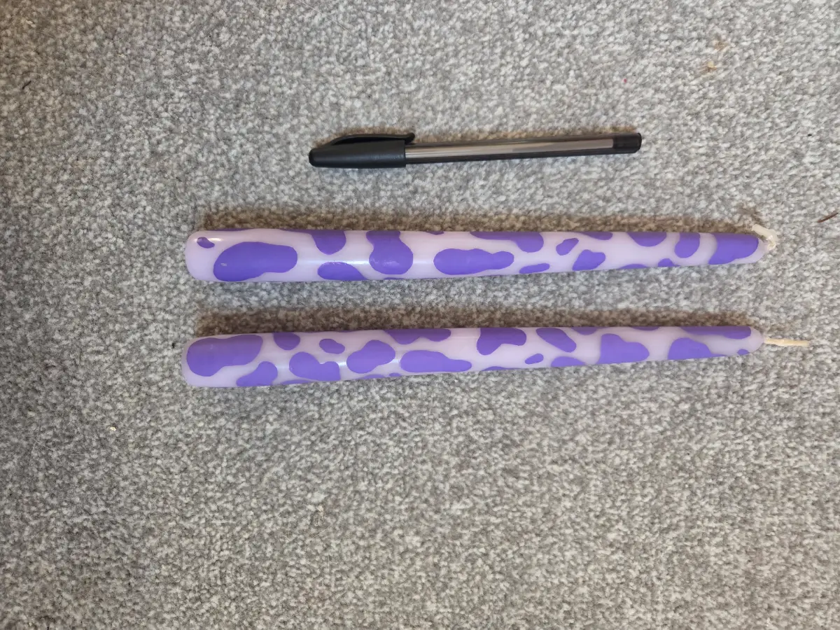 Purple cow printed taper candles