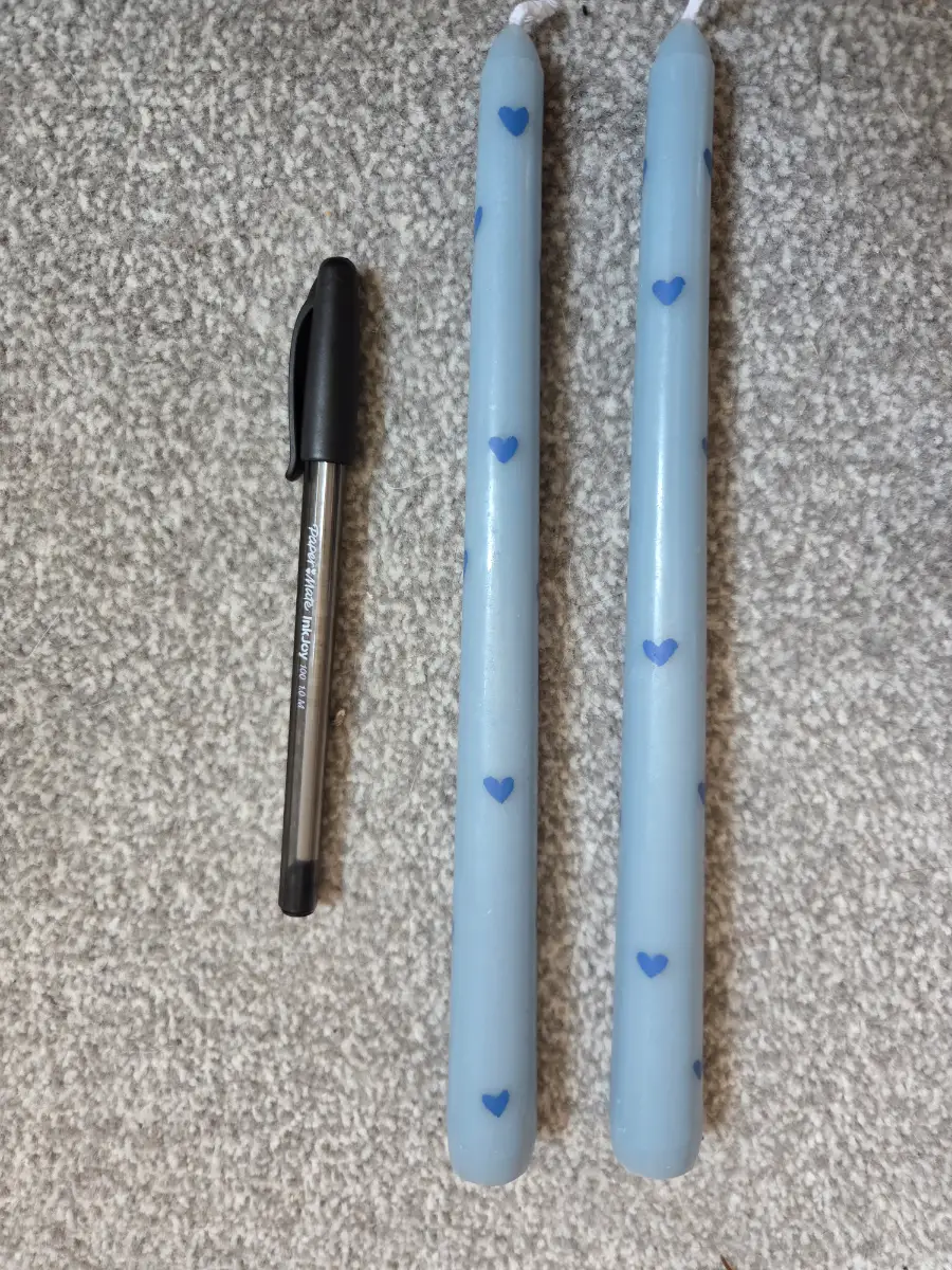 Light blue taper candles with blue hearts