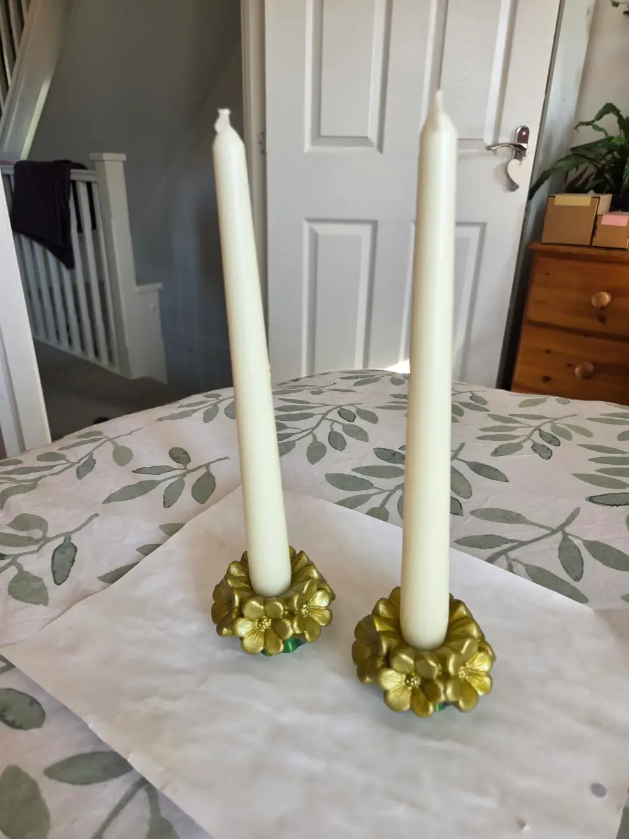 Golden flower candle holders