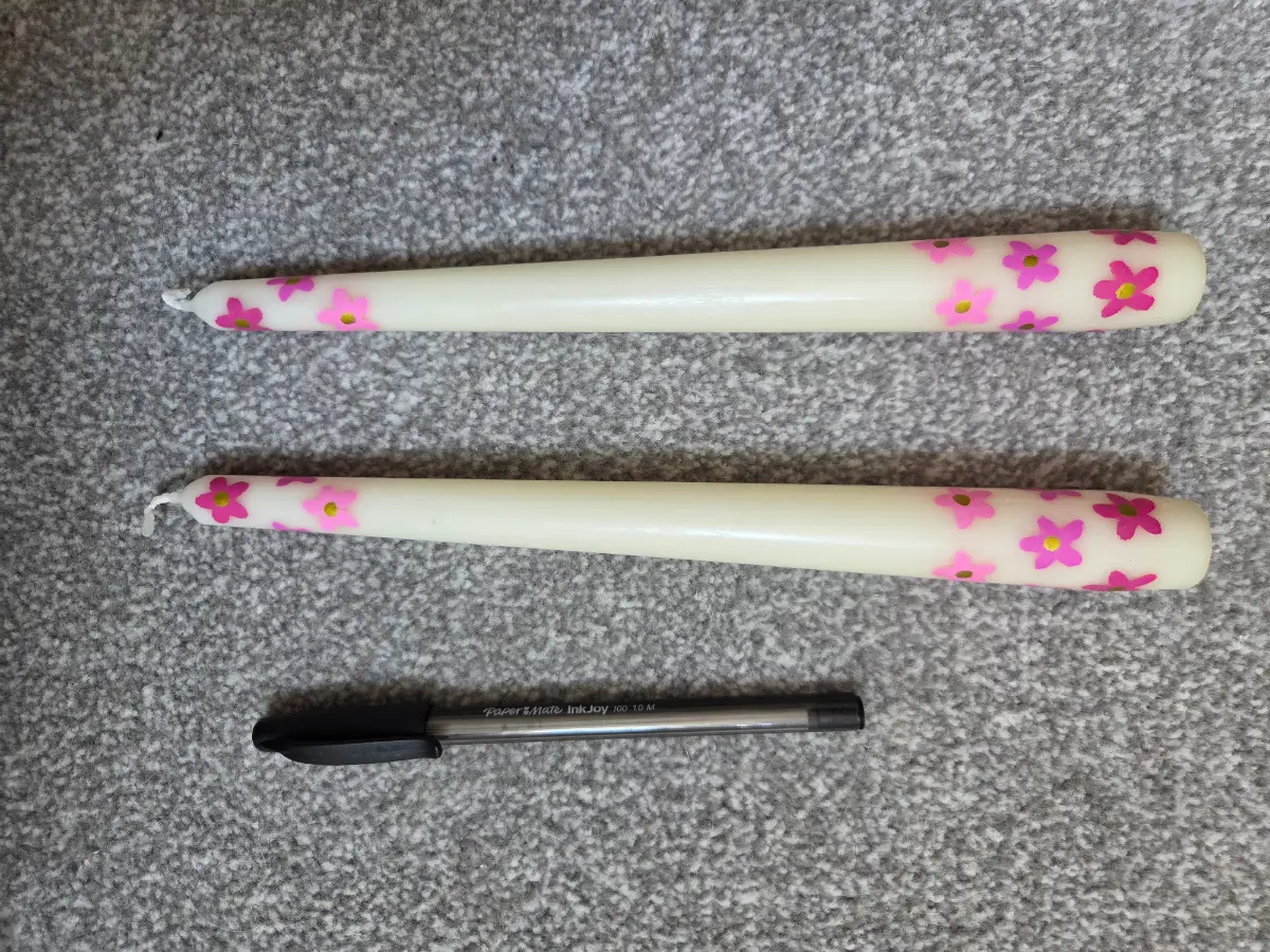 Cute pink flowers on 2 taper candles