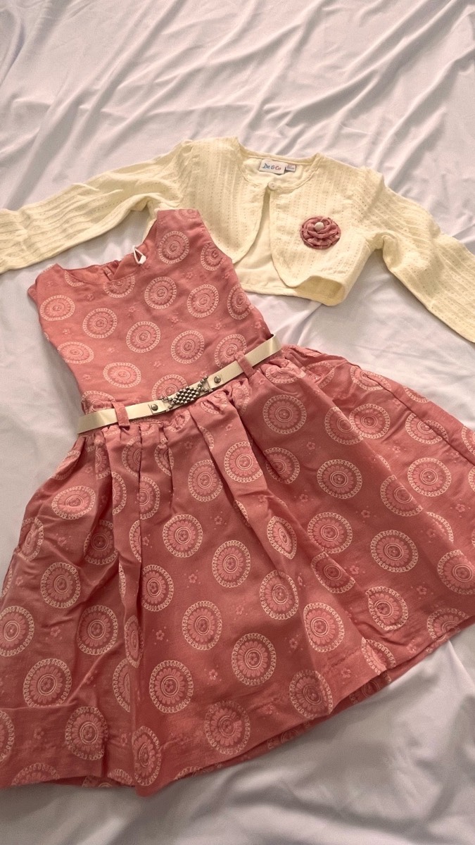 Pink Frock with cream shrug