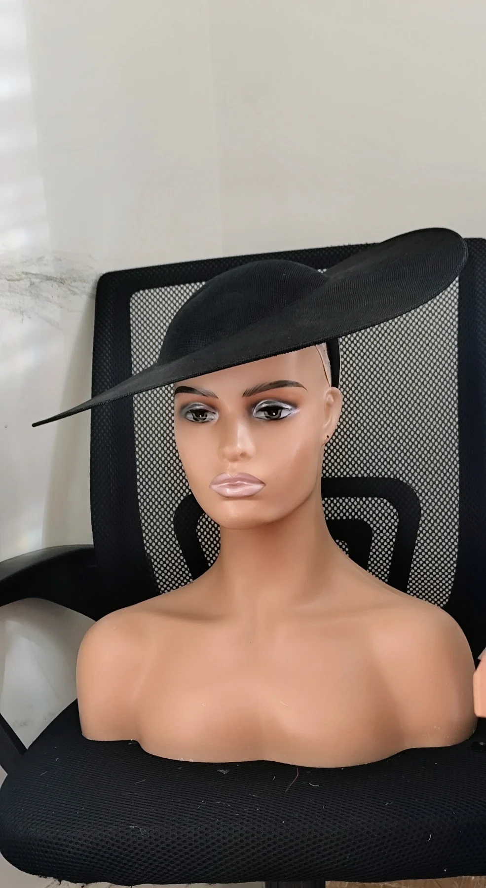 Elegant black fascinator hat perfect for special occasions wedding ascot races parties