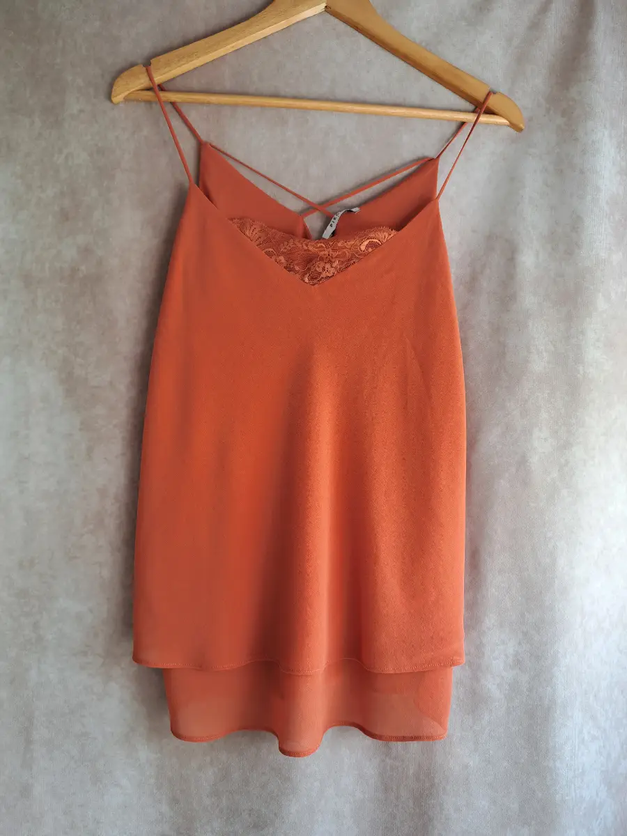 Pieces orange strappy cami. Size L.