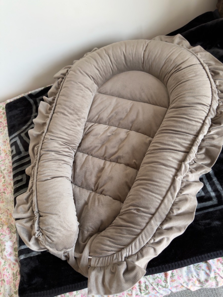 Beautiful beige Baby nest pod for pot 6 months