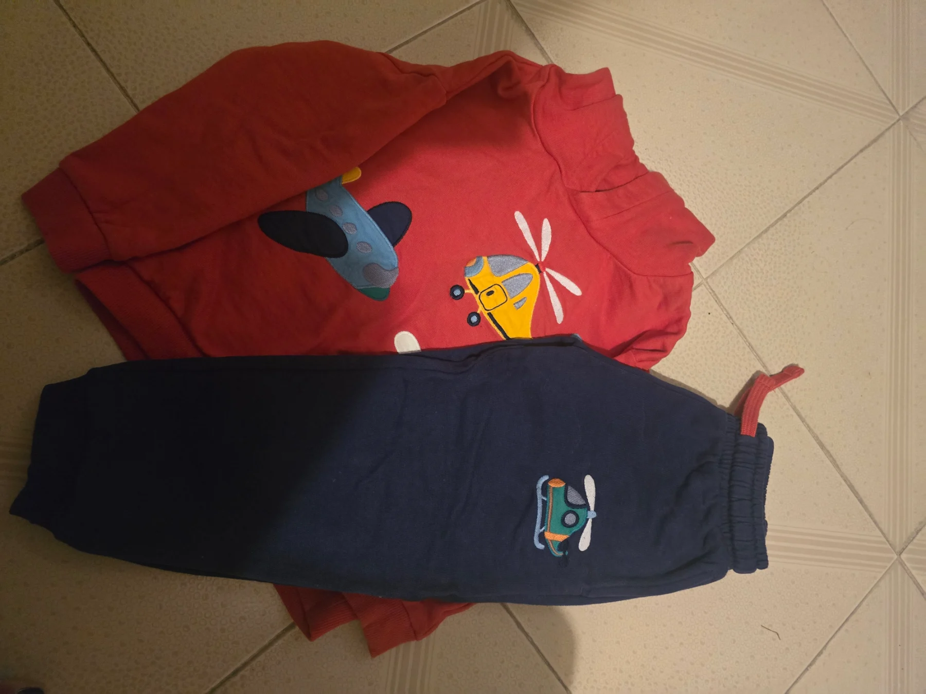Next transport theme tracksuit.