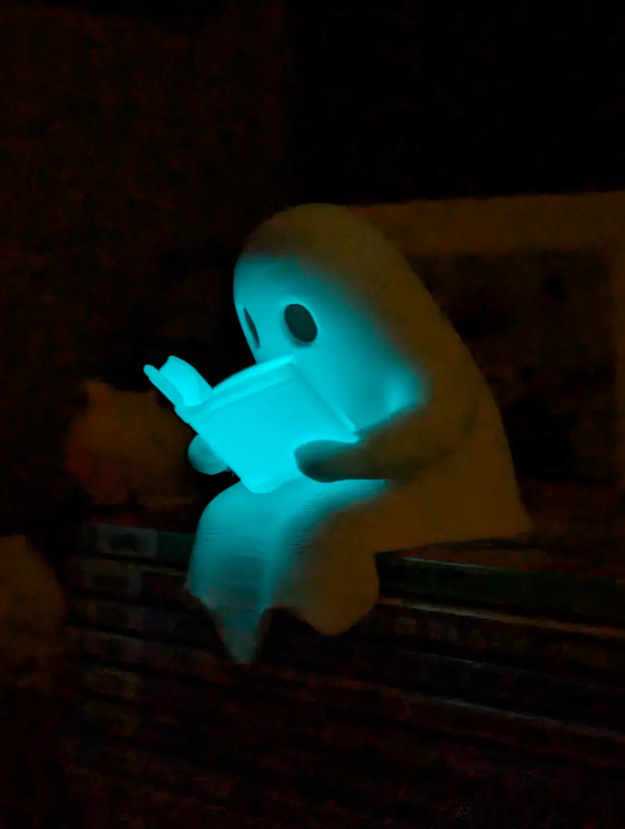 Luminescent reading boo ghost tealight holder