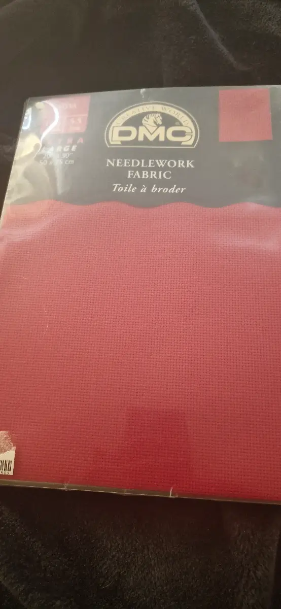 Unopened packet of DMC red aida for cross stitch