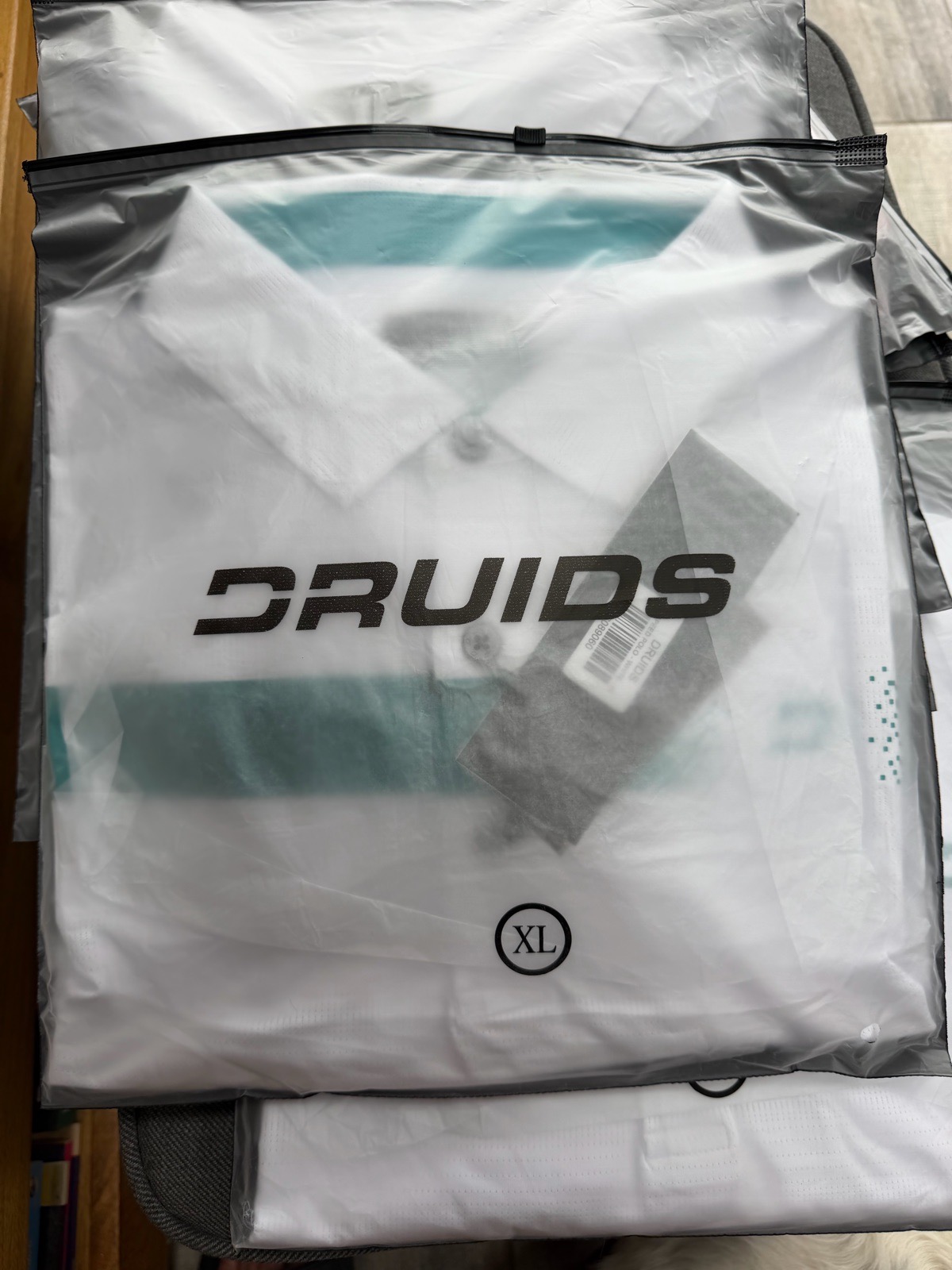 Brand new Druids golf polo