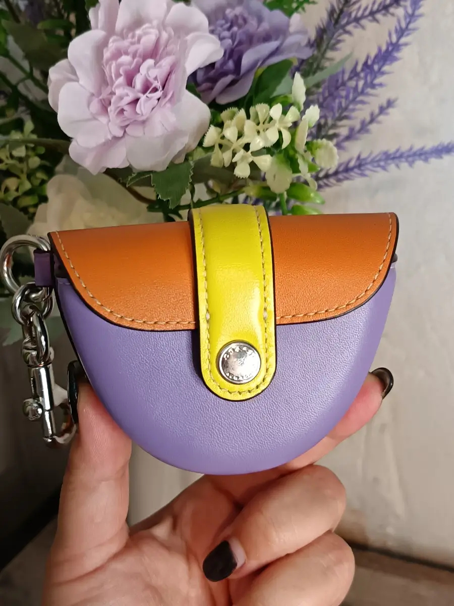 Coach Purple and Orange Mini Saddle Charm Purse Keychain