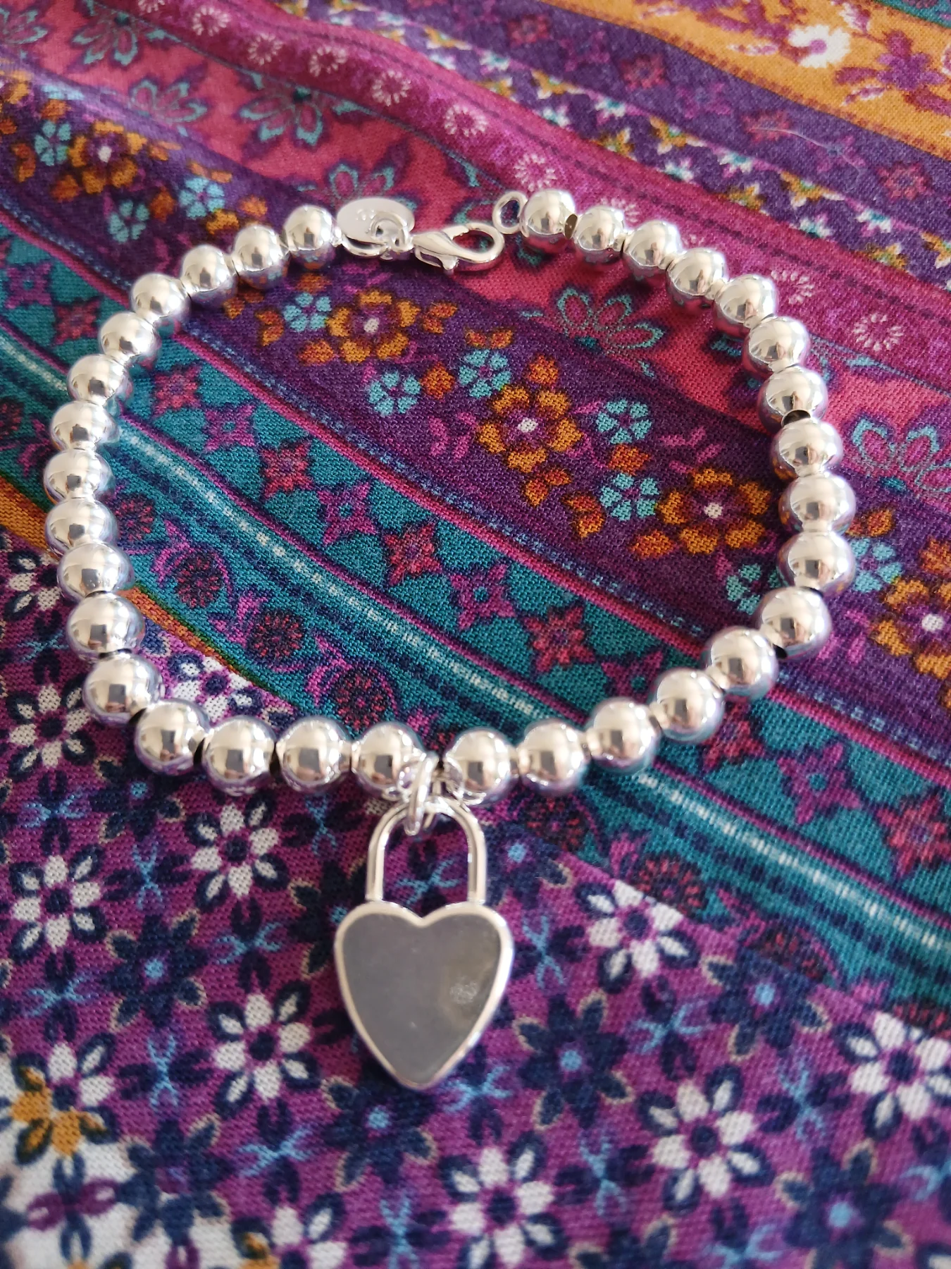 Silver stamped 925 bracelet with heart padlock silver charm