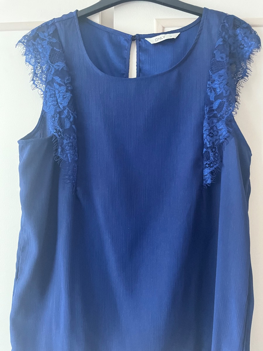 Blue sleeveless top with lace detail