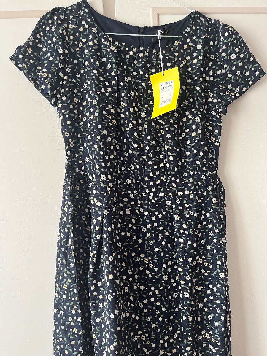 Brand new with tag. Navy flowery dress